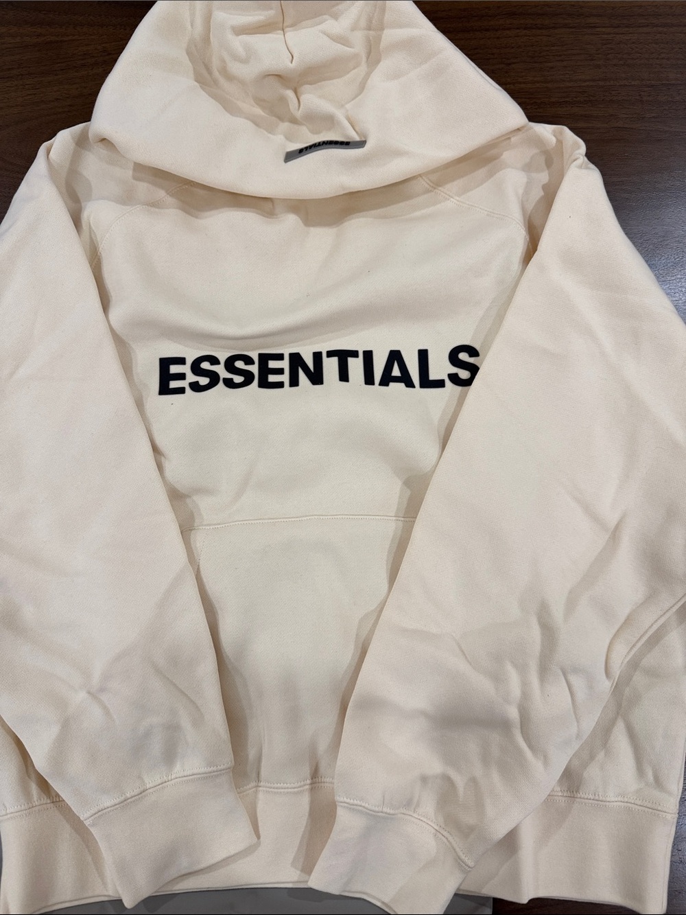 Essentials Men's Cream Hoodie with Black Logo